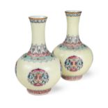 A pair of Chinese pale yellow ground bottle vases,