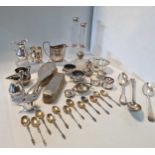 A collection of silverware including salts, cream jugs, flatware, napkin rings etc, 40ozt