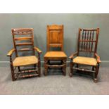 Two North Country rush seat armchairs and an 18th century oak panel back side chair (3)