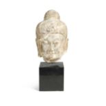 A marble head of Avalokitesvara, Sui Dynasty style,