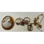 Four dress rings, hallmarked or assessed as 9ct gold, a cameo brooch stamped '9CT', a hallmarked 9ct