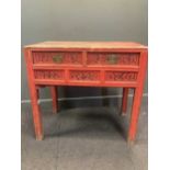 A Chinese red painted hardwood table with two frieze drawers (base to drawers broken),90 x 94 x