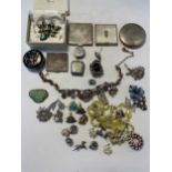 A collection of vintage costume jewellery including items of Christian Dior (one in the original