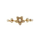 An Edwardian split pearl brooch,