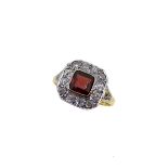 An Art Deco garnet and diamond ring,