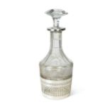 An early 20th century French metalwares silver mounted cut glass decanter,