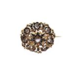 A late 19th century diamond and enamel brooch,
