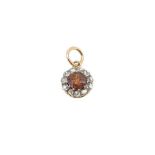 A zircon and diamond pendant,