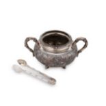 An early 20th century Chinese export metalwares sugar bowl and associated nips,