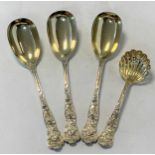 A four-piece set of Victorian silver gilt serving flatware,