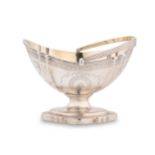 A George III 18th century silver swing handled sugar basket,