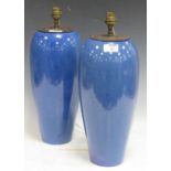 A pair of Moorcroft powder blue ceramic vases converted to lamps, 41cm high (2)