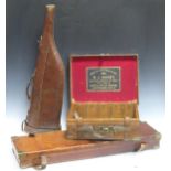 A Lang & Hussey leather and oak cartridge box 14 x 42 x 31cm, together with a rectangular leather