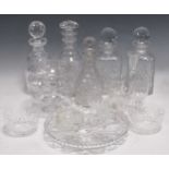 A collection of mixed cut and other glass, including cut glass decanters, stem ware, bowls etc.