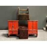 A pair of small red lacquered hanging cupboards, a medicine box with carrying handles and other