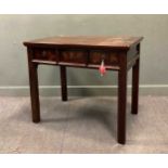 A Chinese hard wood table with three drawers decorated with pomegranates and vines, 86 x 100 x 69cm