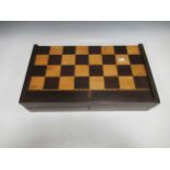 A folding inlaid wood draughts and backgammon boardmasurements for this lot is 11 x 46 x 27 cm