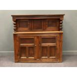 A 17th century and later oak panelled court cupboard, bearing date '1669', 154 x 157 x 58cm