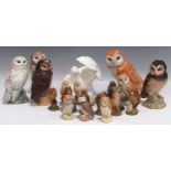 A collection of Royal Doulton & Beswick porcelain and moulded resin owl figures, etc (22)