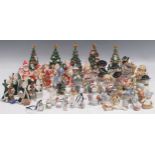 A large collection of Royal Copenhagen porcelain Christmas figures, to include Annual Santa