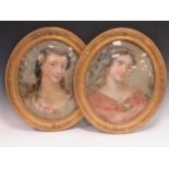 A pair of reverse glass painted portraits of ladies