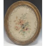 A pair of Victorian floral silkworks in oval gilt frames, 54 x 49cm (2)