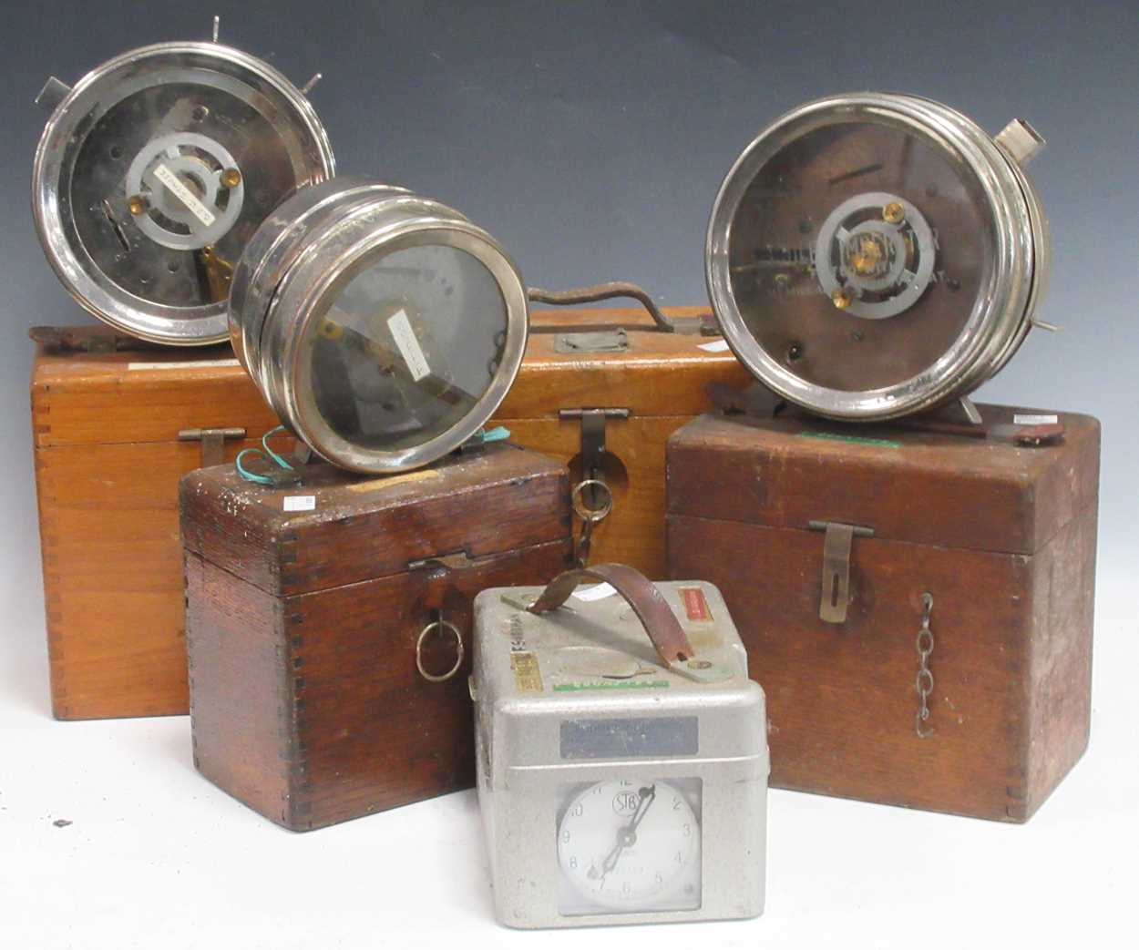 A collection of racing pigeon clocks, various cases and designs (5) in