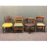 An antique corner chair, George III dining chair, an oak frame open armchair and another antique