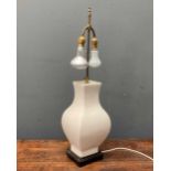 A white glazed ceramic lamp base in the Chinese style, 72cm including fitting