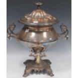 A Victorian silver plate samovar with ceramic grips to the side handles, 42cm high