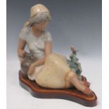 A Lladro model of a young girl with a water jug and a bird, introduced 1978, retired 2007, 30cm high