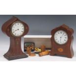 An Edwardian Art Nouveau style mahogany balloon-shaped mantle clock, 26cm high, and another, 20.