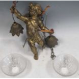 A bronze cherub hanging light with glass shades, approx 26cm high 24.5cm head to foot. Wear to the