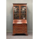 An inlaid mahogany bureau bookcase, 19th century, 227 x 106 x 56cm