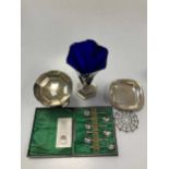 A quantity of silver including a cased set of spoons, bon bon dish, pedestal dish and filled vase