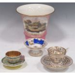 A 19th century Spode cabinet cup and saucer, decorated in the Chinese style with a butterfly handle;