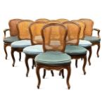 A set of ten Louis XV style walnut dining chairs,