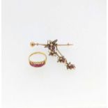 A synthetic ruby ring, worn hallmark for 18ct gold weight 2.9g, together with an insect brooch