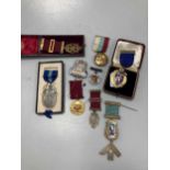 A group of Masonic medals to Brother White, including silver and enamelled St Johns Lodge, etc