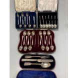 A collection of silver flatware and cutlery including cased teaspoons, cased christening set etc