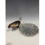 A silver plated shell shaped dish and a sauce boat (2)