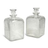 An over-size pair of English cut glass shouldered decanters, 19th century,