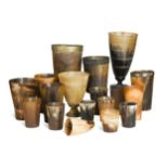 A large collection of horn beakers and goblets, mostly 19th and early 20th century,