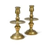 A pair of brass candlesticks, possibly Spanish, 18th century,