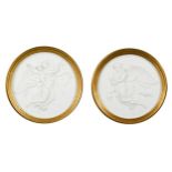 A pair of Copenhagen bisque roundels,