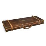 James Purdey & Sons, a brass-bound oak and leather double gun motoring case,