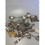 A collection of silverware including flatware, cruets, pin tray etc., 11.3ozt gross together with