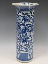 A 19th century Chinese blue and white vase, of cylindrical form, decorated with a dragon and bamboo,