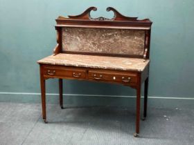 A late Victorian mahogany dressing table on square tapering legs and catsers and matching marble top