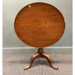 A George III mahogany tripod table, 80cm diameter and another smaller tripod table 51cm diameter (